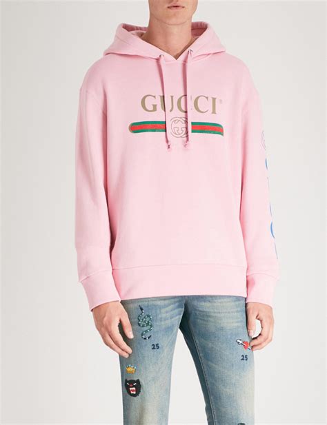 pink gucci sweatshirt.